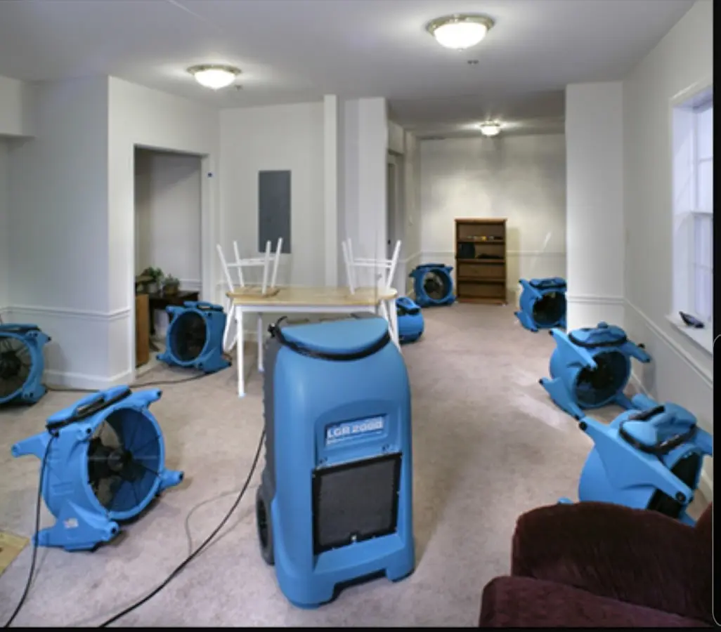 Air movers and dehumidifier setup for Water Damage Restoration in Goffstown